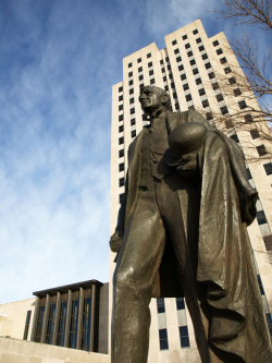 Statue with Capitol in background